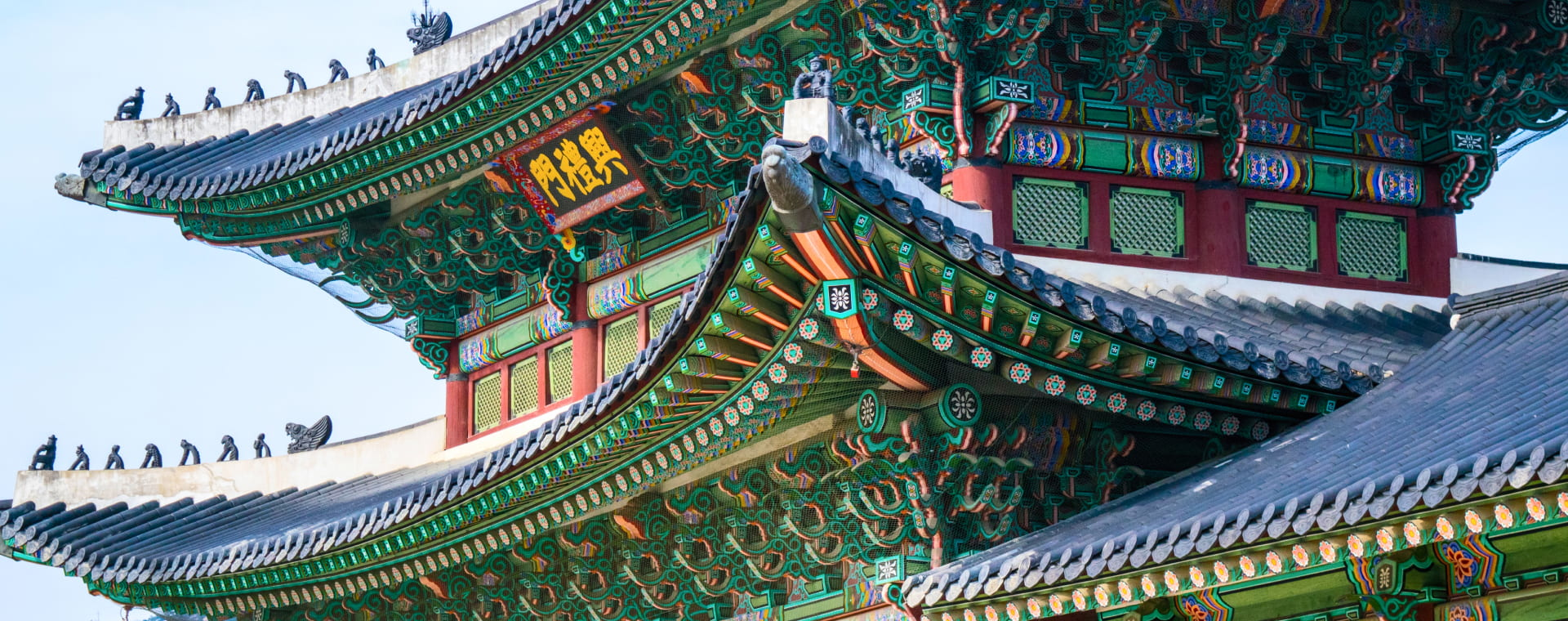 A close up of an asian style building.