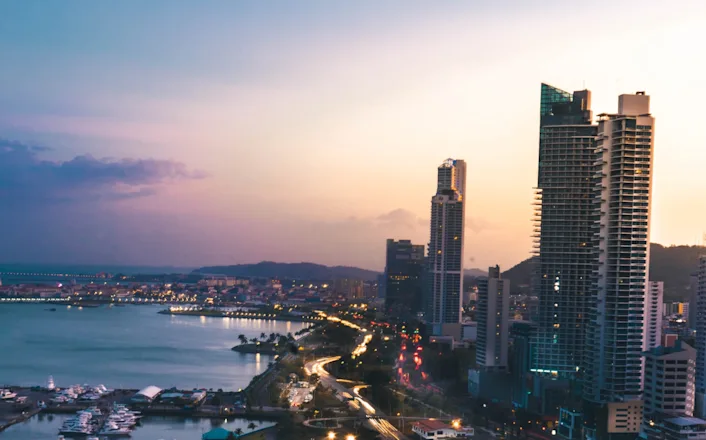 The skyline of panama city at dusk.