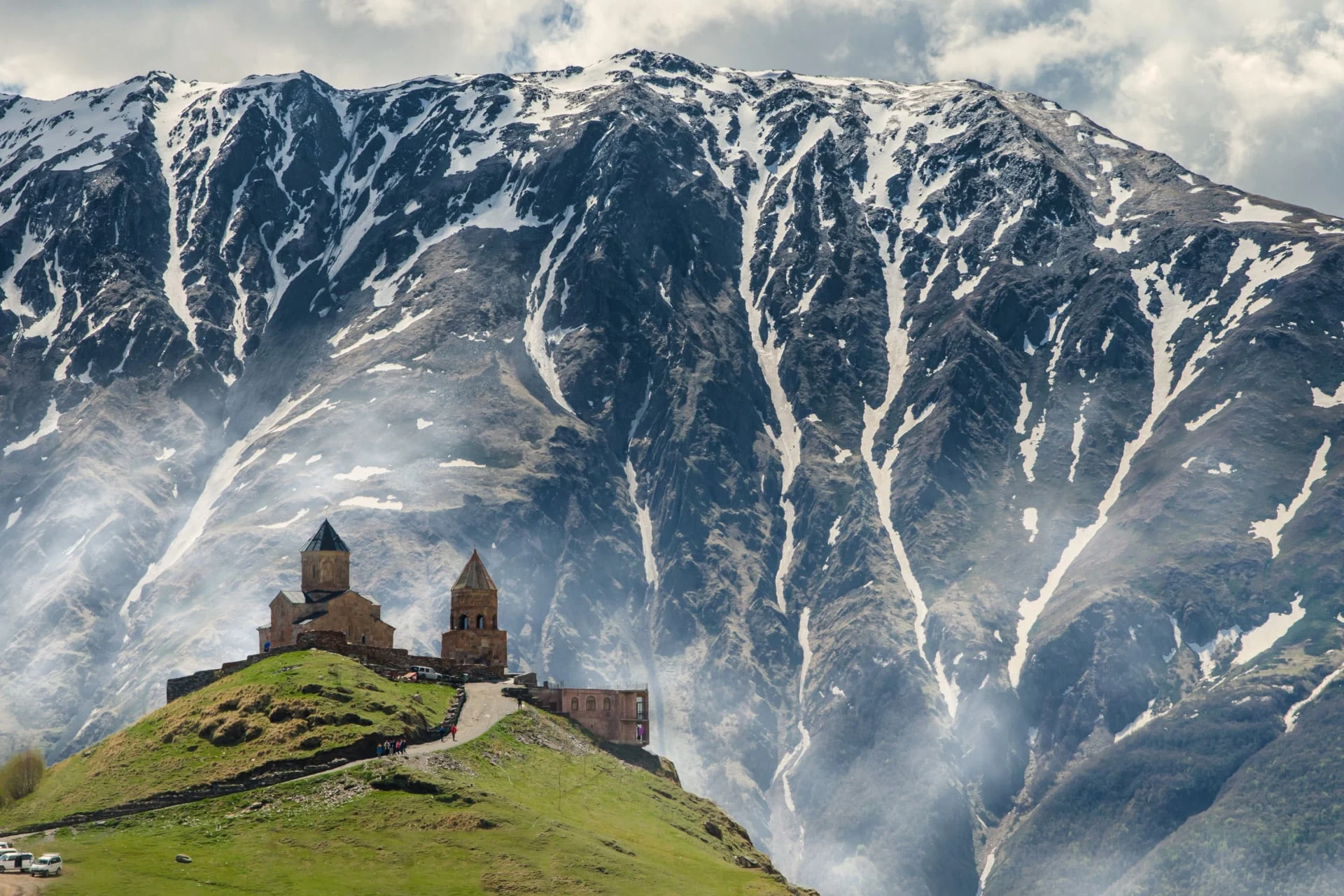 A church sits on top of a mountain.