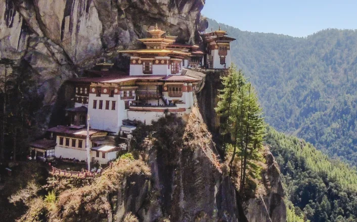 A temple on top of a cliff in bhutan.