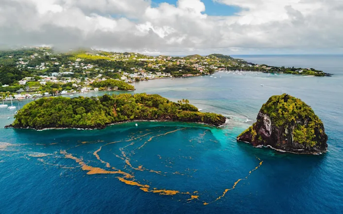 An aerial view of a small island in the ocean.