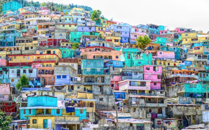 Colorful houses on the side of a hill.