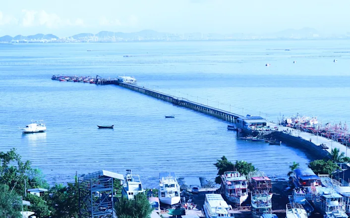 A boat docked in the water.