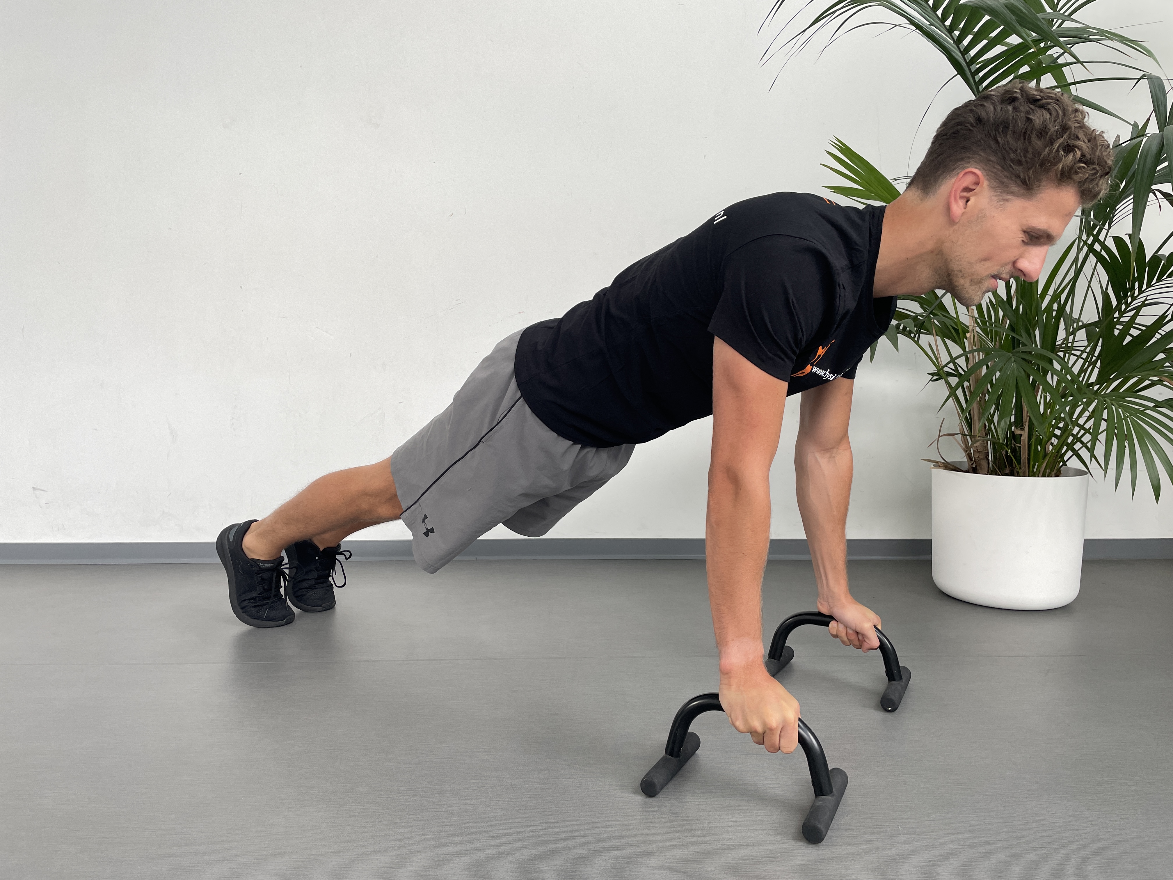 Push up bars in voorligsteun (pols/hand)