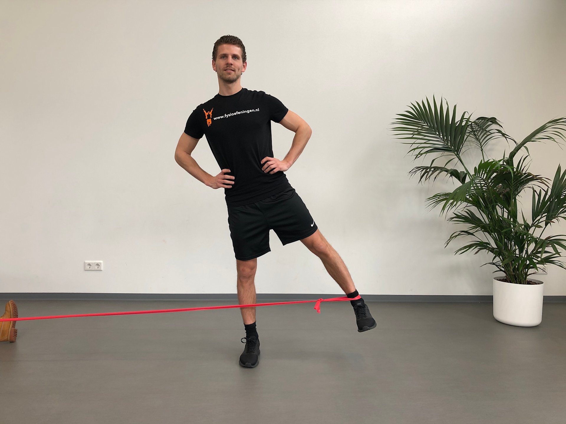 Abduction with elastic band (hip) Hip | Portrait | Abduction | Physiexercise.nl | Breda