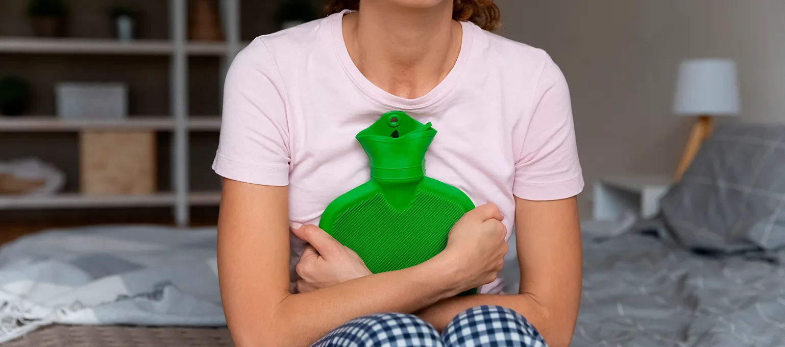 cólicas menstruais de mulheres adultas
