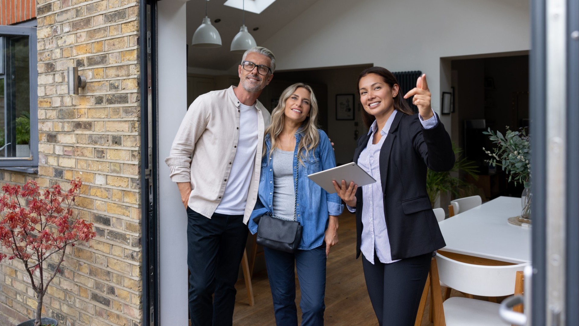 Realtor going over a house with clients.