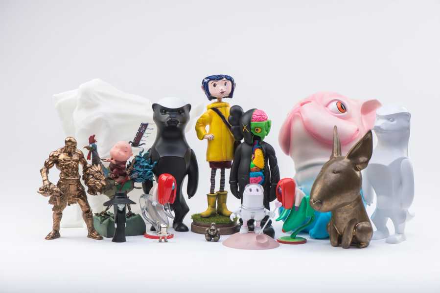 A group of custom vinyl toys