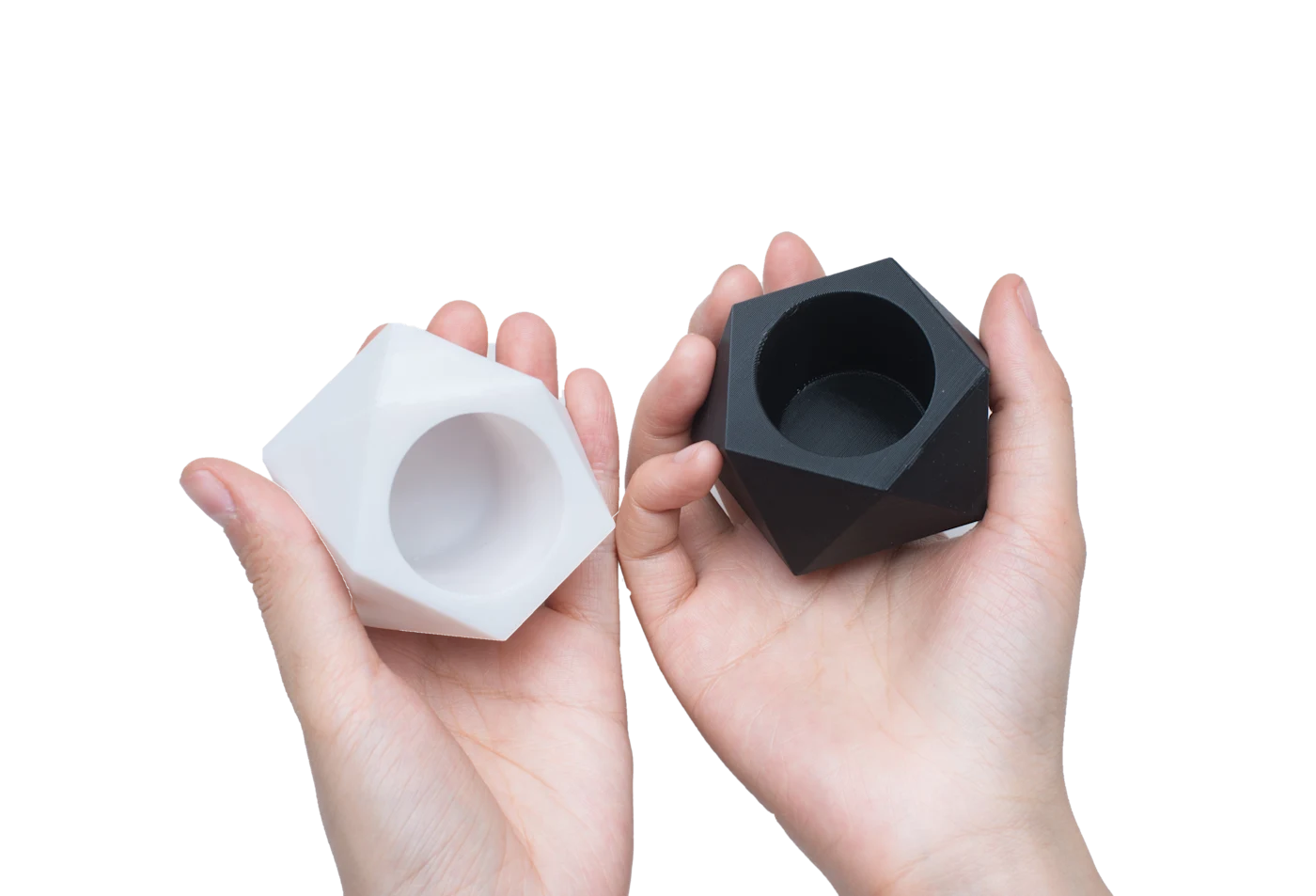 A functional ABS thermoplastic part held in two hands