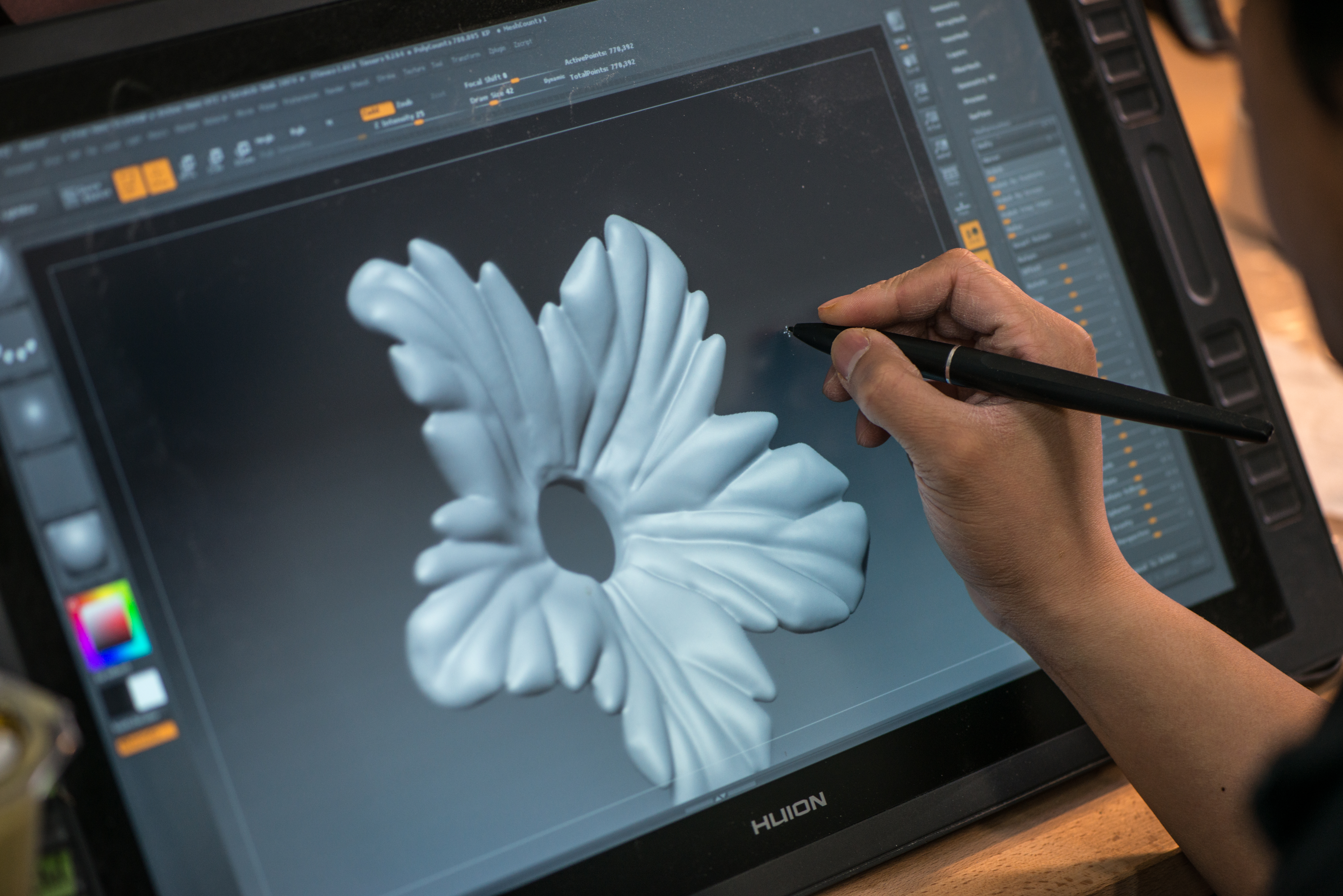 3d artist fixing a 3d scanned file