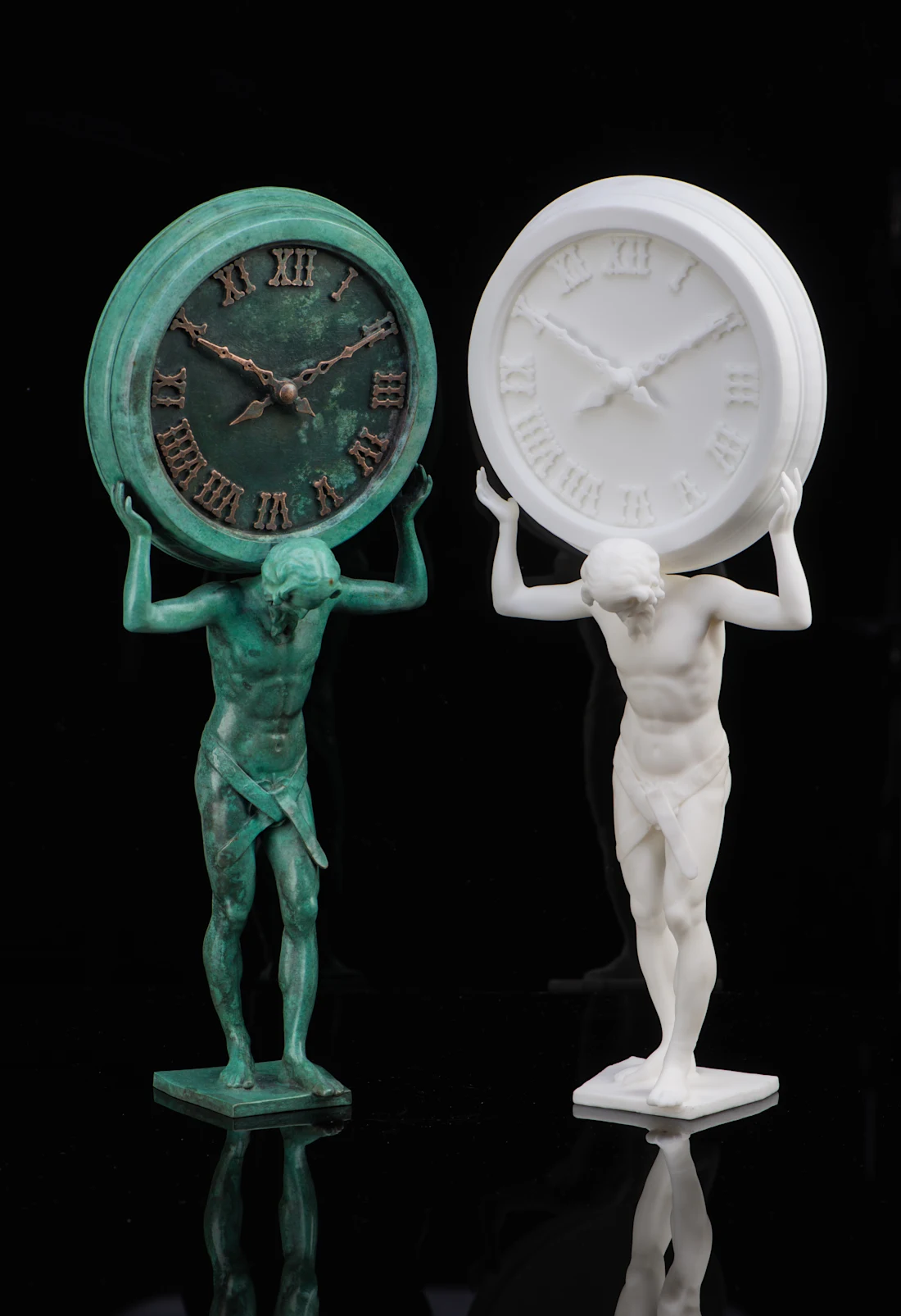 A bronze-finished model beside its unfinished 3D printed version