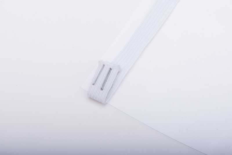 An elastic band stapled on a transparent film