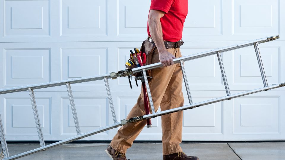 man-carrying-ladder
