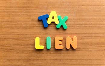 Why Are Tax Liens Being Removed From My Credit Report?