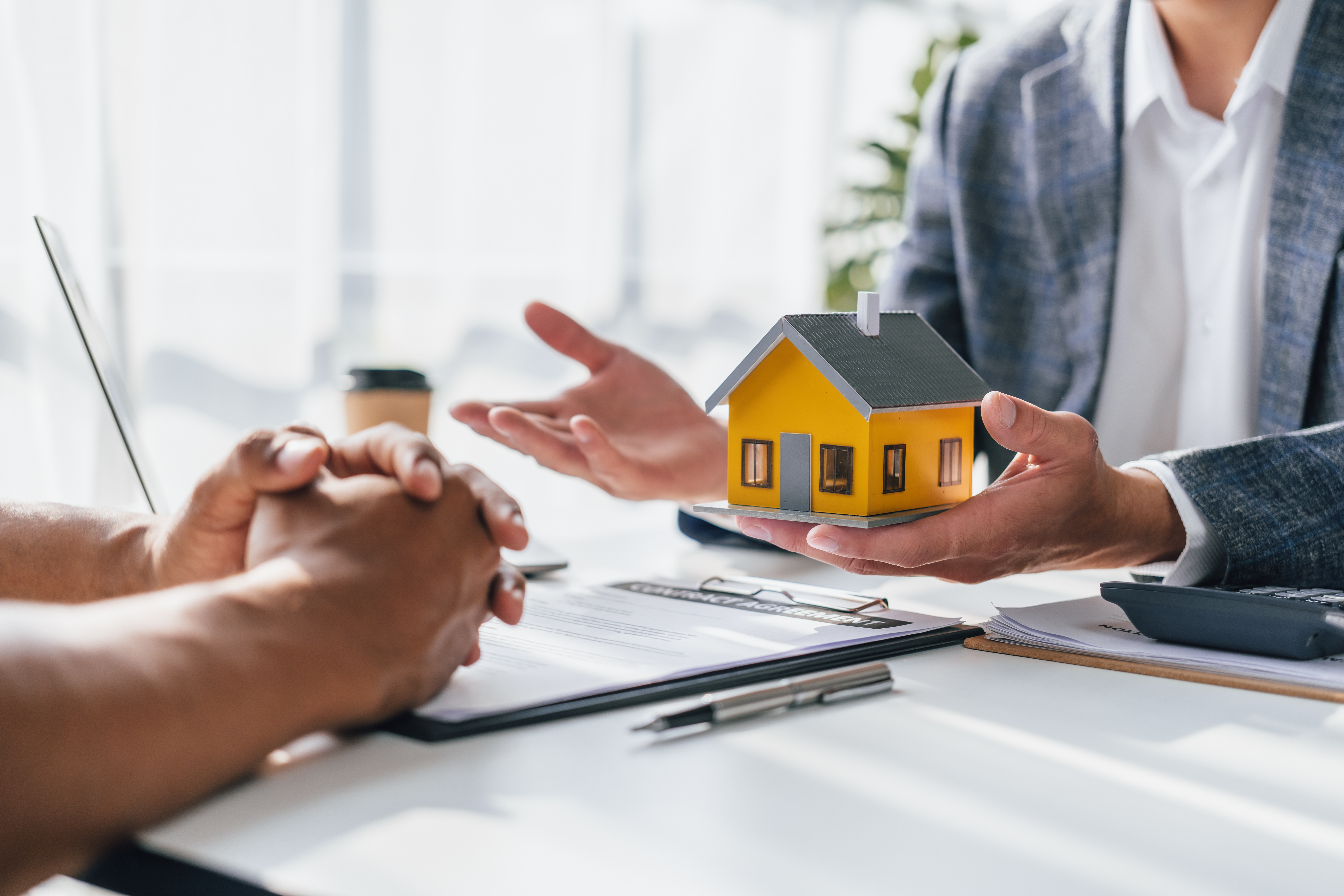 holding-model-house