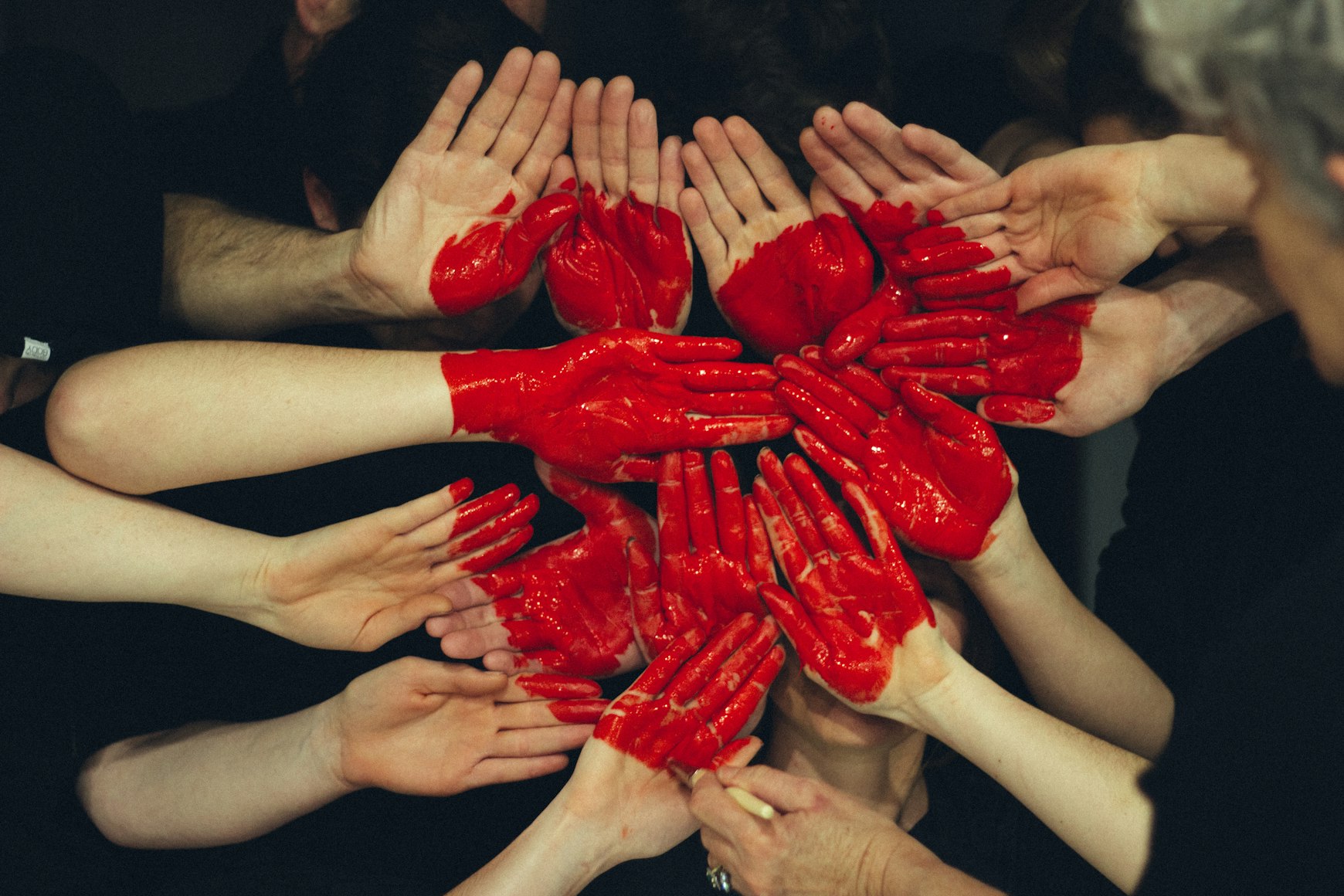 red-paint-hands