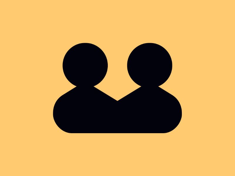 Two people on yellow background.