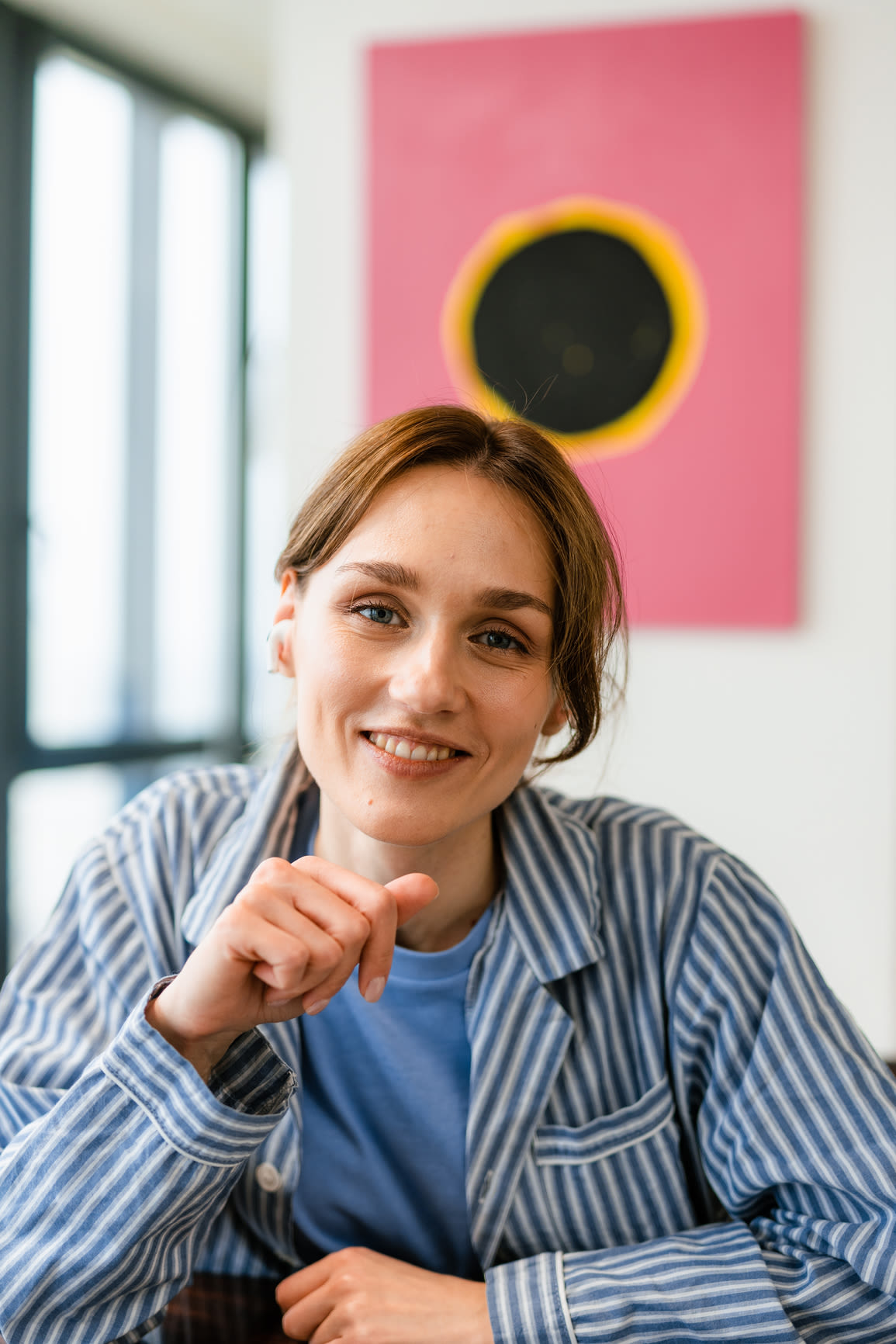 Picture of a woman in a striped shirt