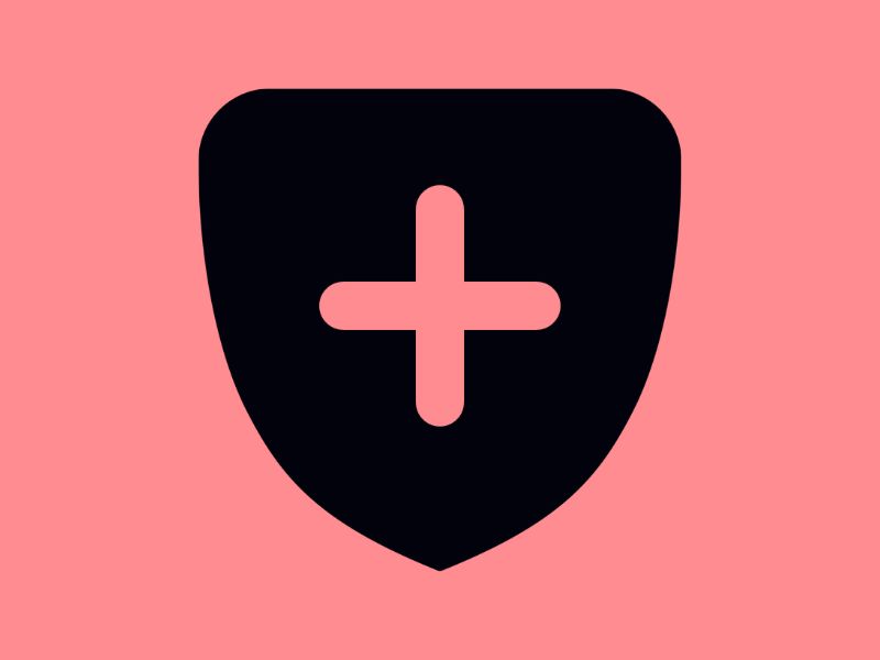 Black shield with cross on pink background.