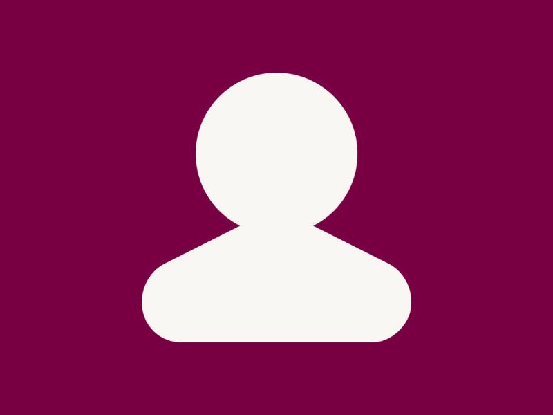 A white silhoutte of a person on a plum red background.