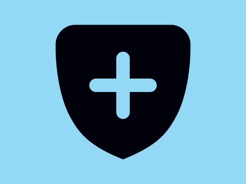 A black shield on a sky blue background.
