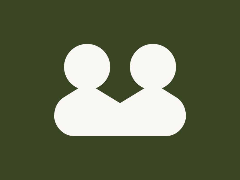 Two white silhouettes of people on a dark green background.