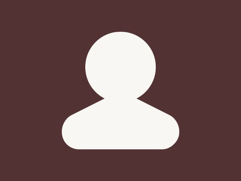 Solid person icon on a dark brown background 