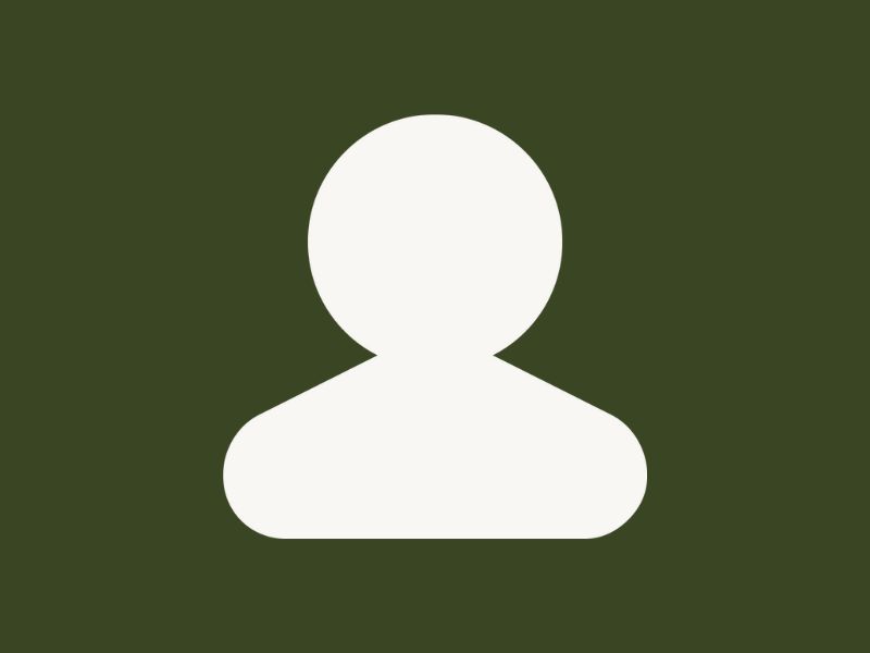 A white silhouette of a person on a dark green background.