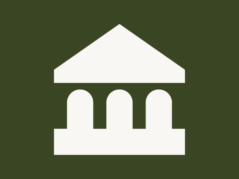 White courthouse icon on a dark green background