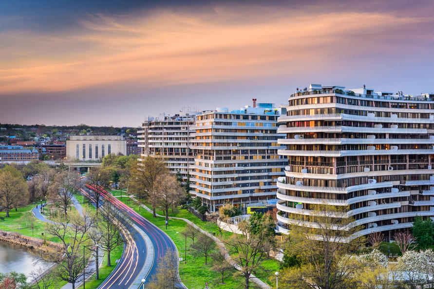 How Much Home Can Millennial Families Afford in These Top Cities? - Skyline of Washington D.C. against a pinkish blue sky. 