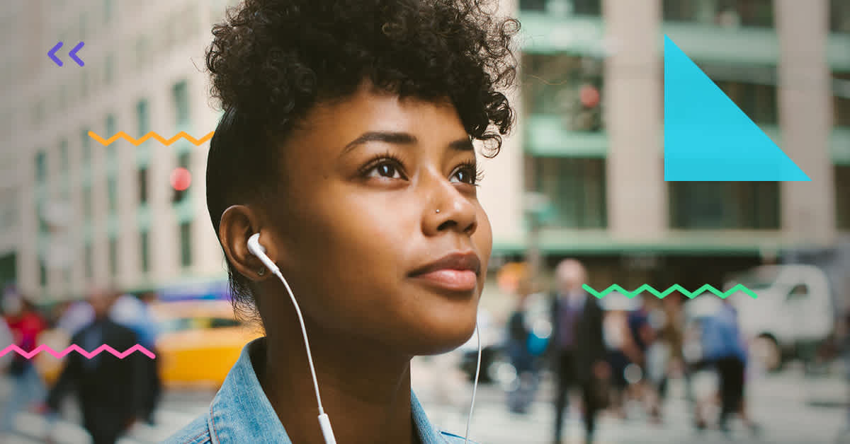 woman listening to headphones in city - why single people need term life insurance