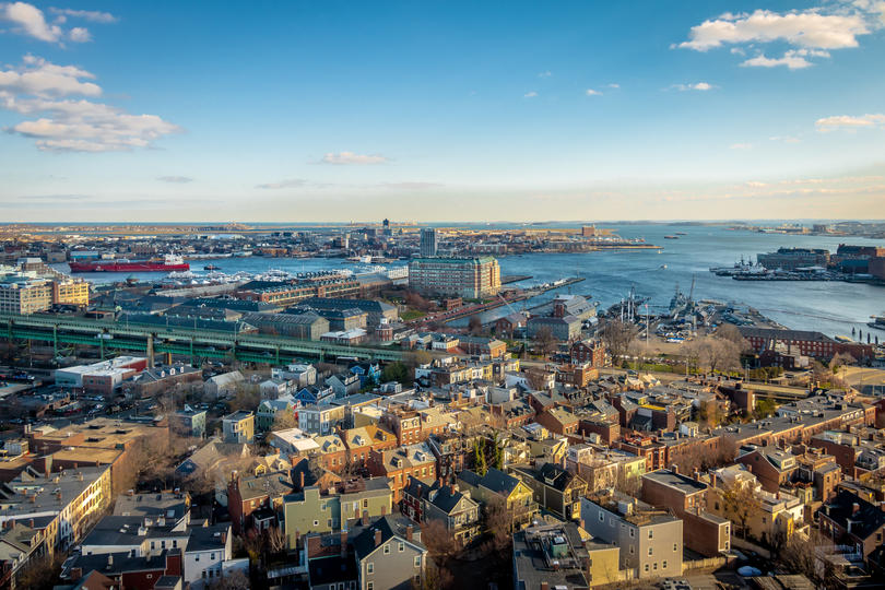 The Best-Paying Cities for Millennials - Boston, Massachusetts skyline and harbor. 