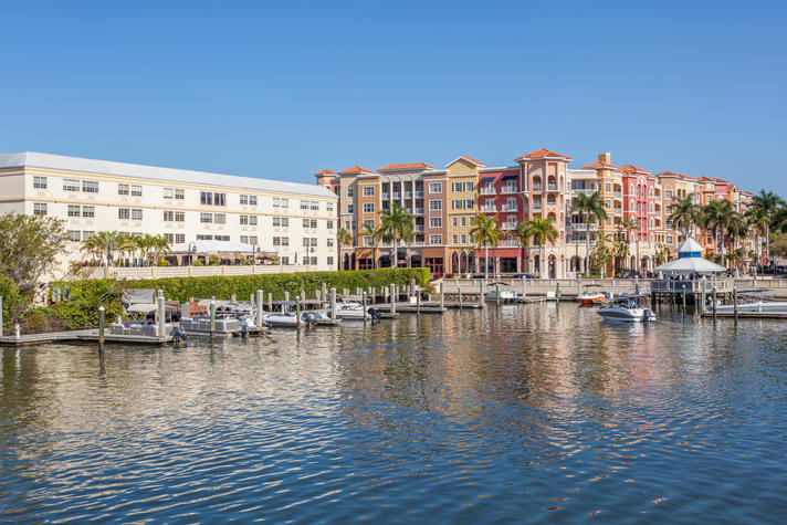10 Best Cities in America for Single Parents - Boat filled dock in Naples, FL. 