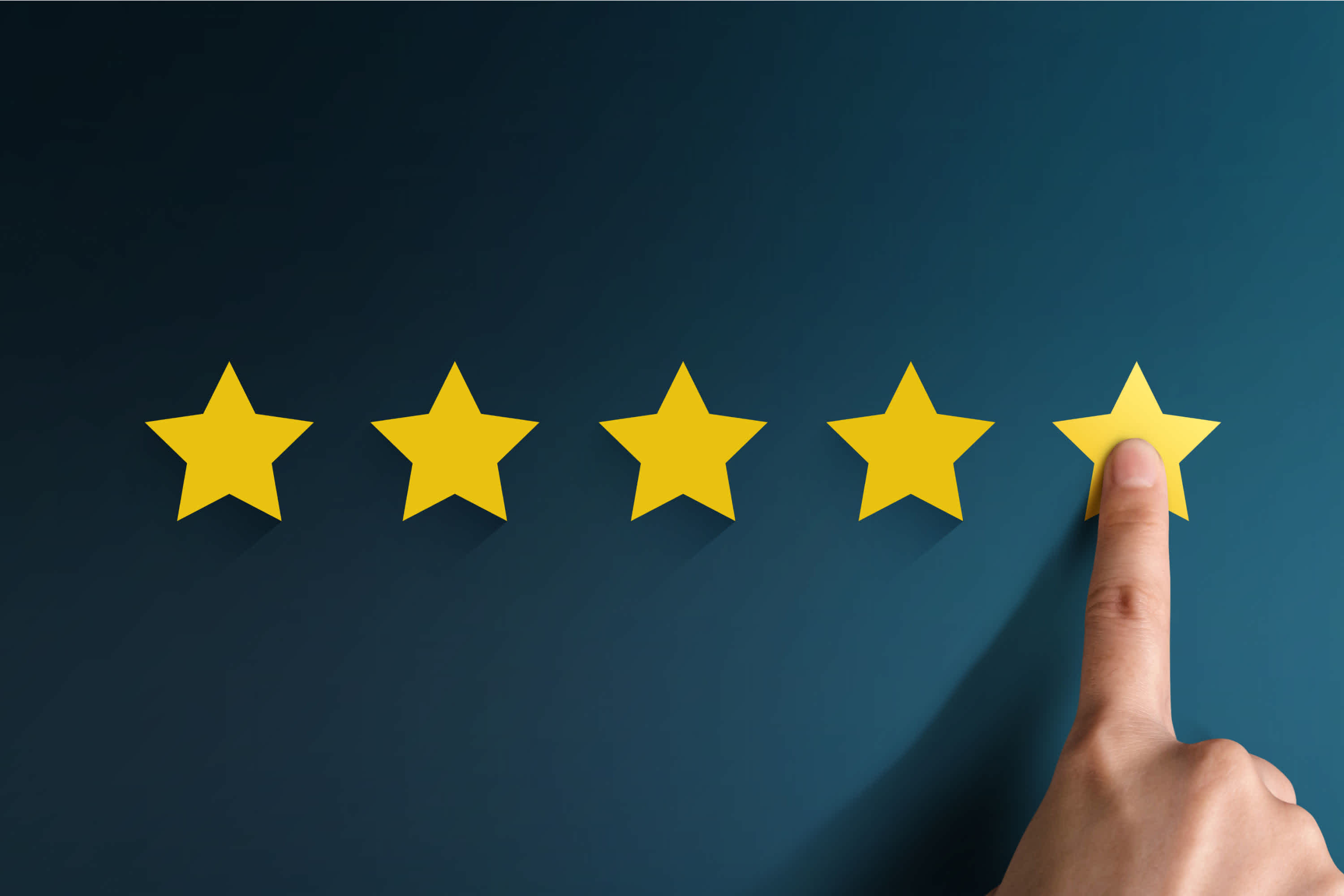 what are life insurance ratings agencies like a.m. best - finger placing paper stars on a board