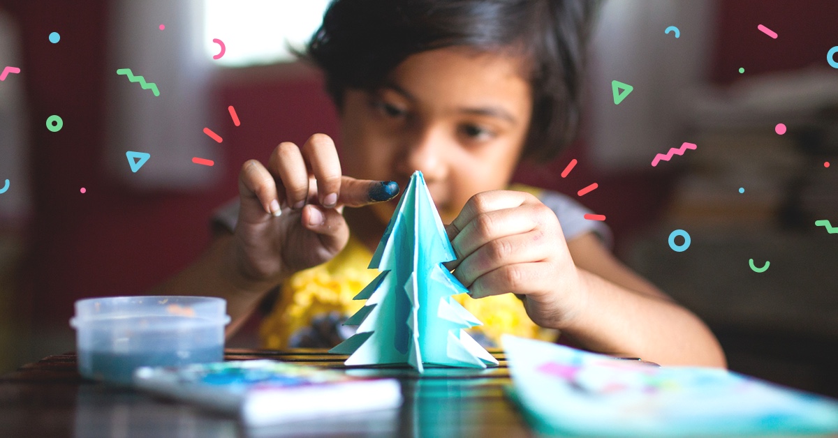 boy doing crafts - how to keep kids busy with solo play