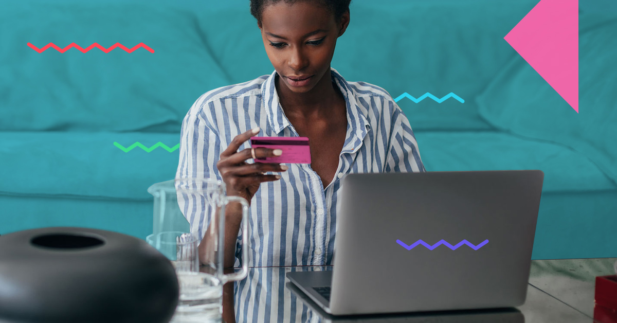 woman using credit card online - what happens if you make a late credit card payment?