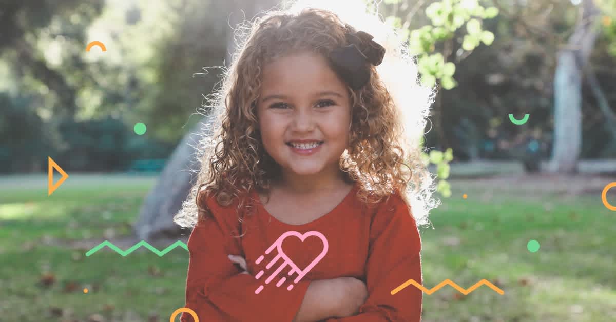 smiling girl in park - how to avoid holiday gift overload