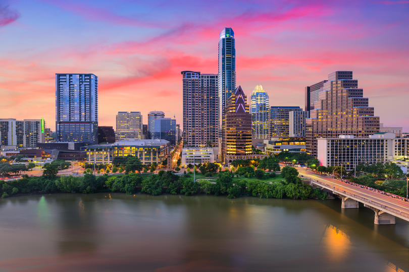 Multiple articles - Skyscraper filled skyline of Austin, Texas during sunset. 