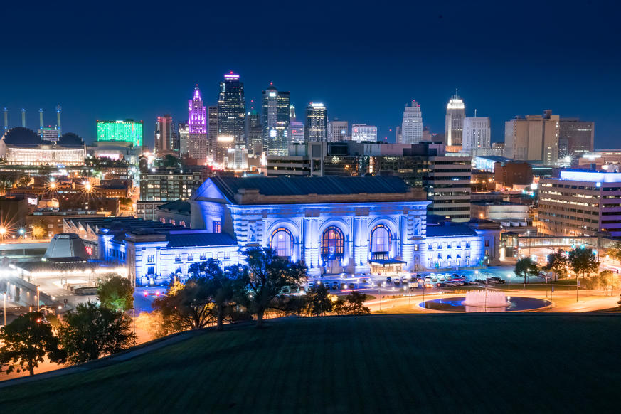 Cities With the Hardest-Working Parents - Kansas City, MO skyline at night.