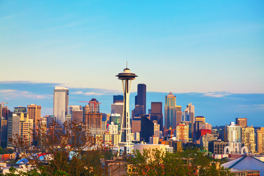 The Best-Paying Cities for Millennials - Seattle, Washington skyline with the emblematic Space Needle. 