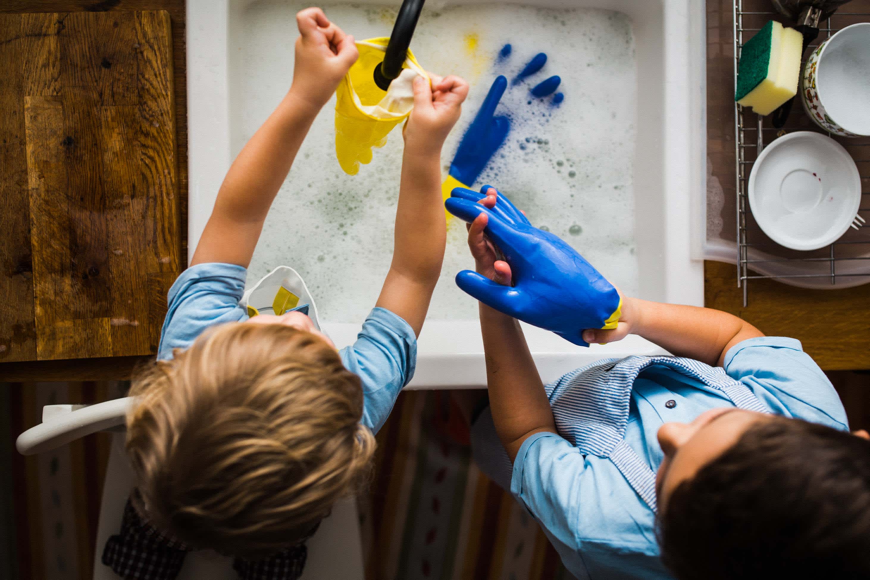 what to know when you have a 7 year old - kids washing dishes