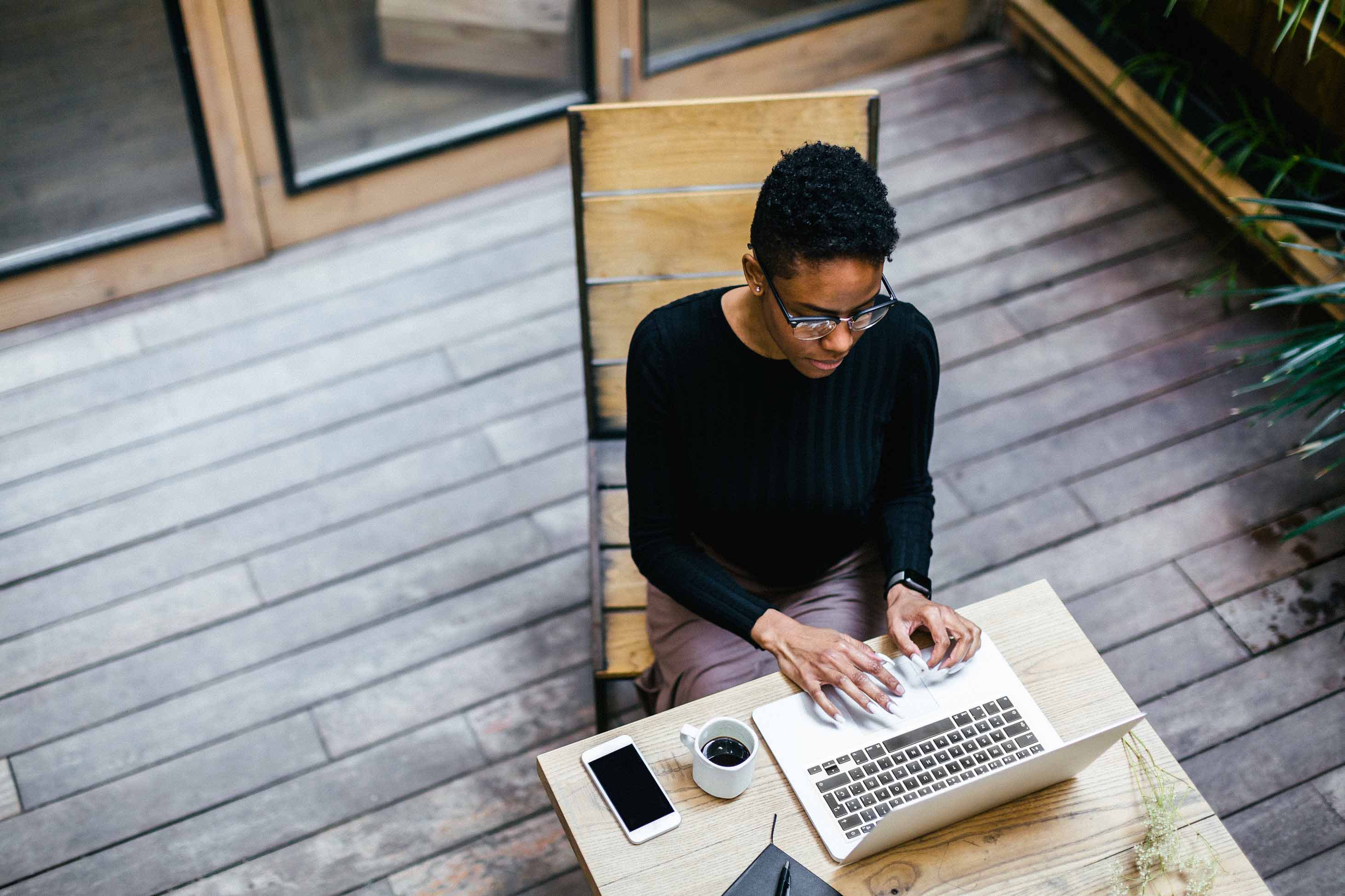 what is a self proving affidavit - person at a computer on a porch with coffee and phone