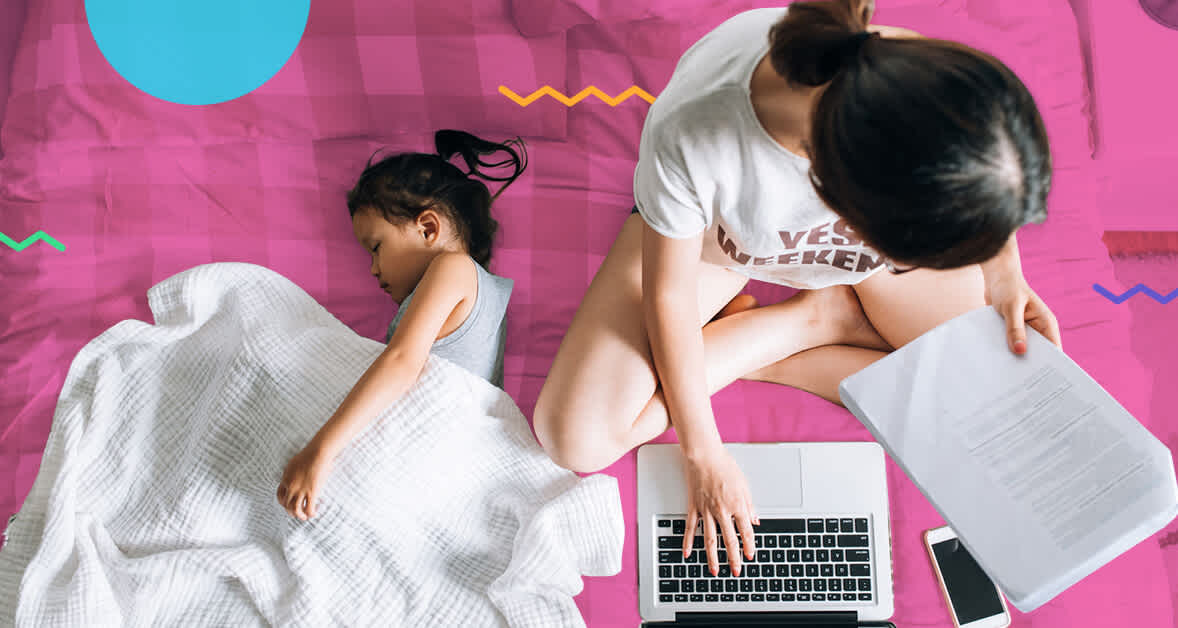 mom on computer next to daughter in bed - 10 things to do that are not housework