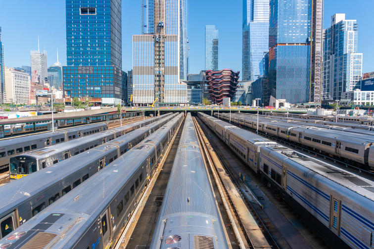 States with the biggest debt problem - New York skyline with train galley in the foreground