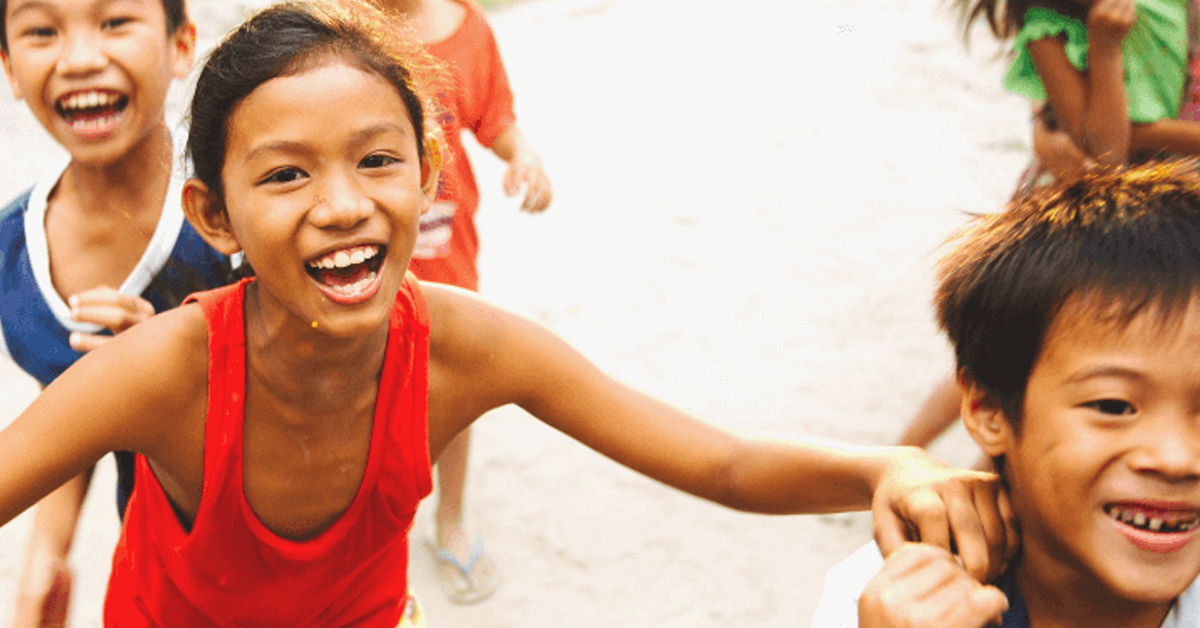 children smiling - podcast and video about why I give 10% of my income to charity