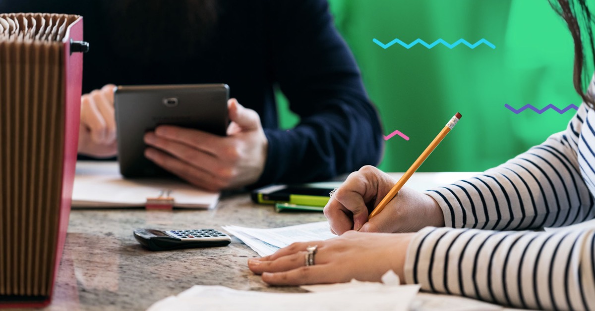 man and woman with paperwork - tax season 2019 for parents