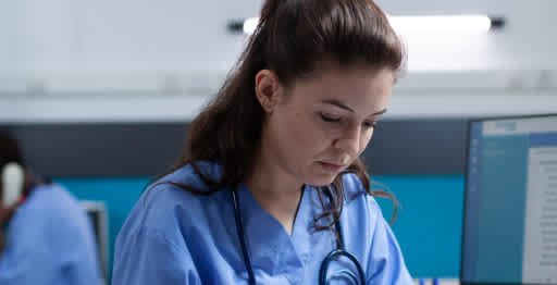An image of a doctor looking down