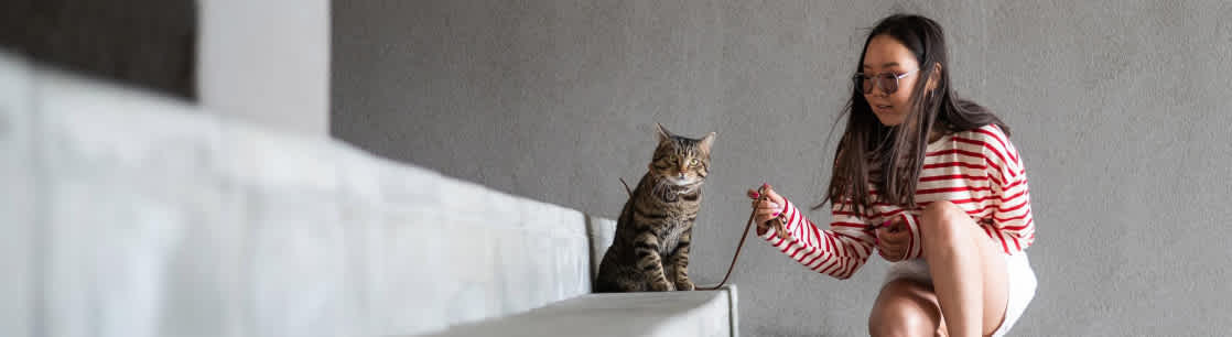 A girl with her pet kitten