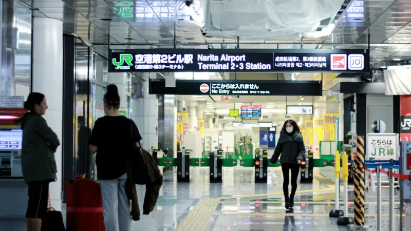 People passing through Narita Airport