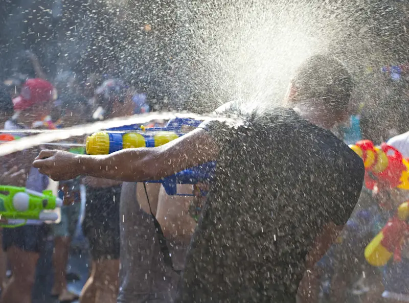 water gun battle during Songkran festival at Silom Road Bangkok